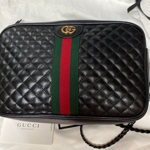 Gucci Trapuntata Quilted
Leather Camera Cross Body
| Size: 10"L × 2.5"W × 6.5"H